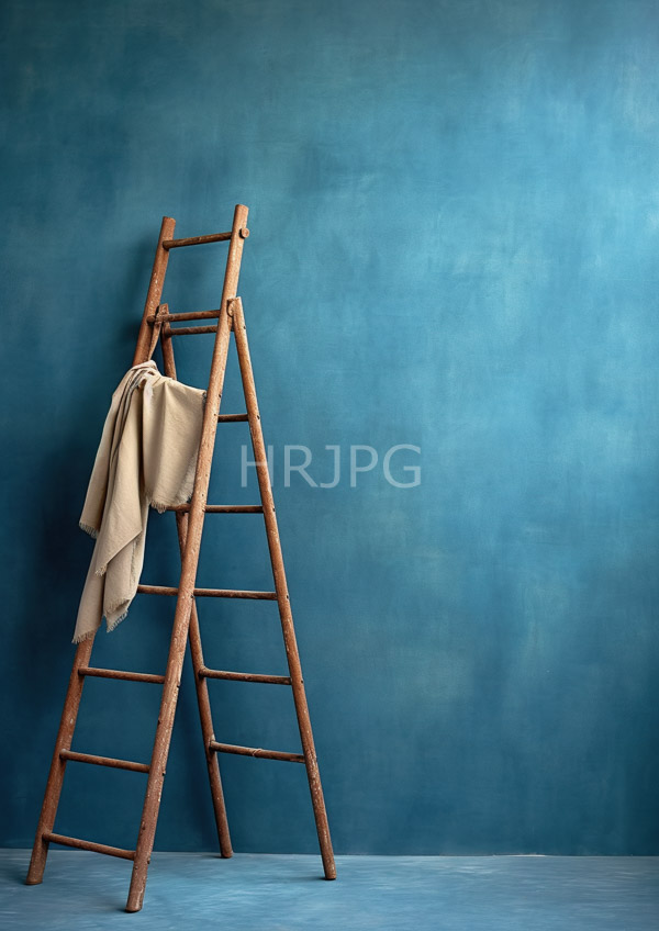 High Resolution: Old wooden ladder leaning against a smooth blue wall and floor with a subtle texture a beige cloth draped over one rung on the left side download. | HRJPG.com