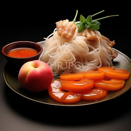 High Resolution: Asian-style dish on a dark plate features translucent noodles topped with shellfish and garnished with mint leaves accompanied by orange slices red apple and a dipping sauce download. | HRJPG.com