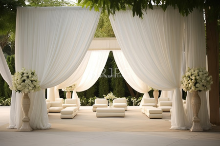 High Resolution: Elegant outdoor wedding or event setup featuring white sheer curtains draped from tall pillars download. | HRJPG.com