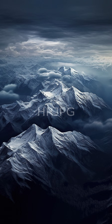 High Resolution: Snow-capped mountain peaks under dramatic cloudy skies with soft sunlight breaking through clouds at top right corner download. | HRJPG.com