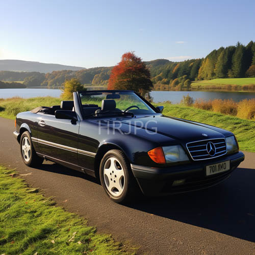 sleek mercedes convertible juxtaposed against untamed outdoor landscape textures