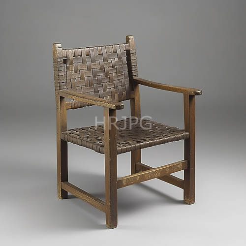 antique wooden chair showcases artisanal precision in polished timber frame