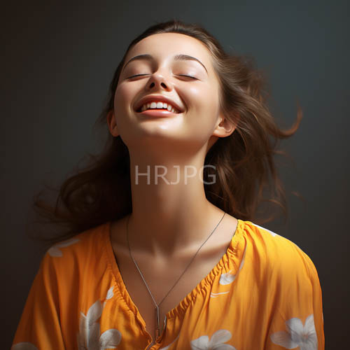 joyful woman in orange florals against dark backgrounds amidst wavy hair and necklace