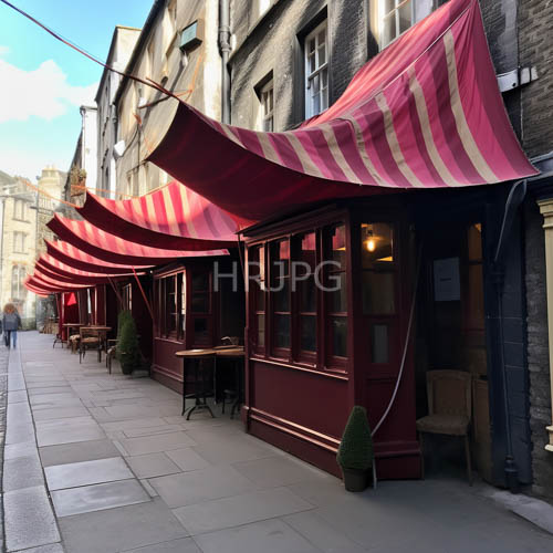 striped canvas awnings shade wooden cafe tables against dark window glass