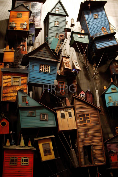 wooden houses rise above water in southeast asias stilt villages landscape