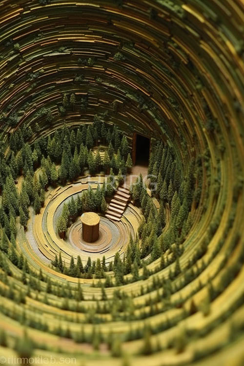 terracotta terraces form concentric circles on green hills